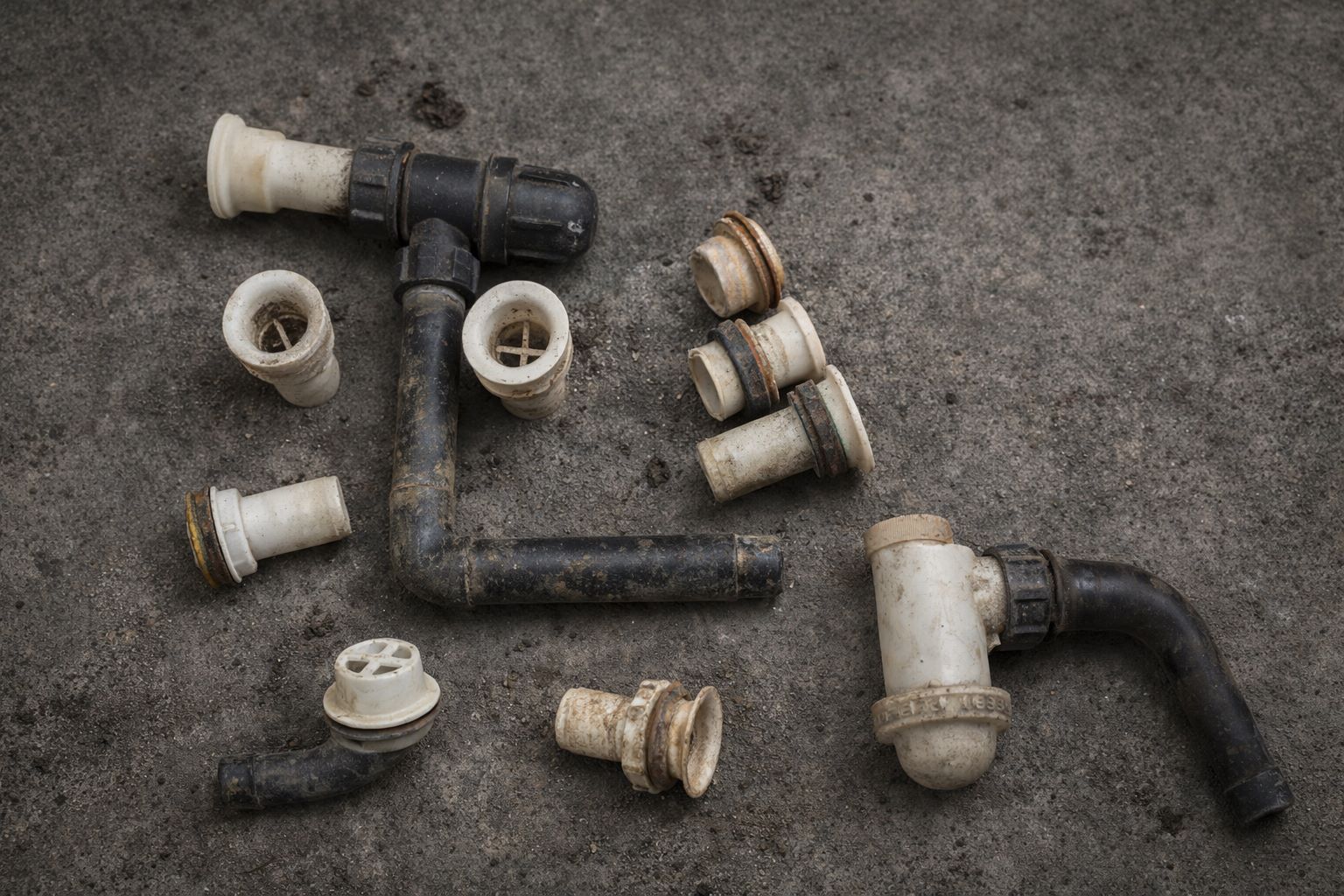 Старый сифон акриловой ванны